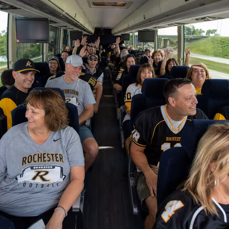 Black Mercedes Sprinter van staged for an Rochester Sporting Event Transportation group