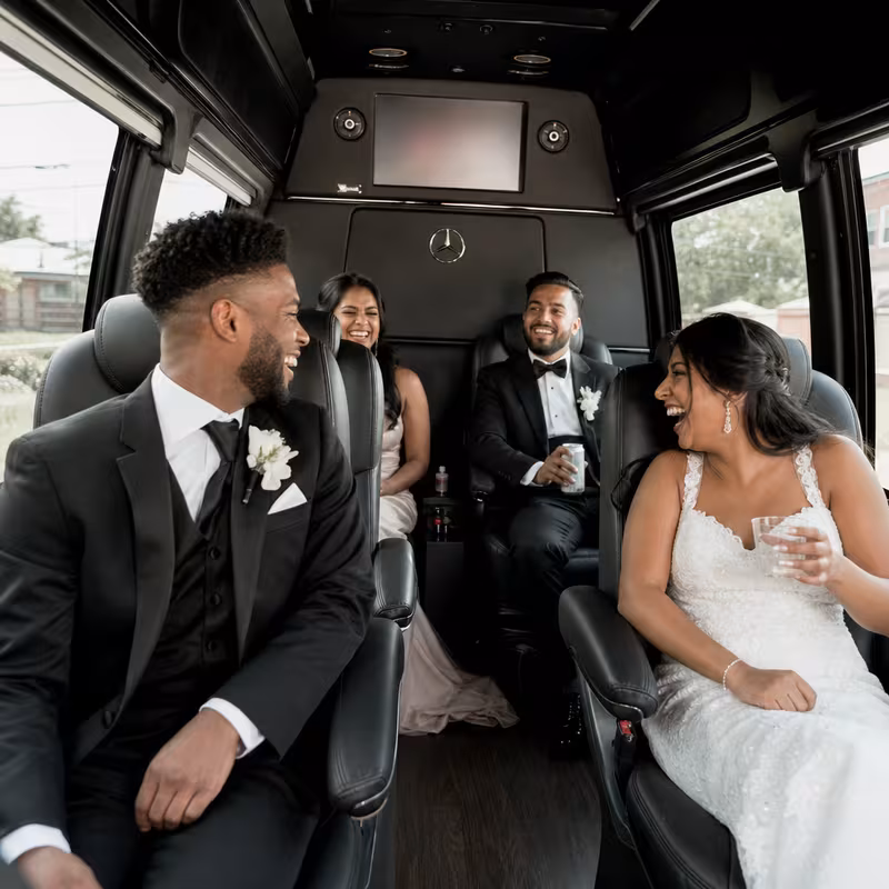 Black Mercedes Sprinter van staged for an Rochester Wedding Transportation group